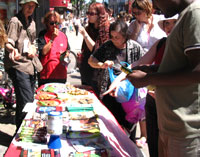 crowds around the stall